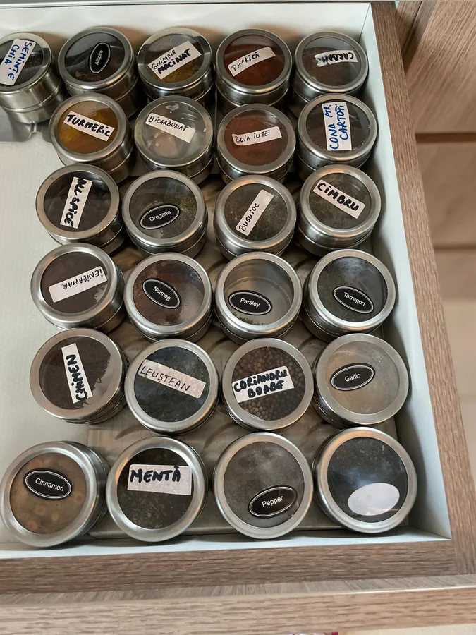 Organized spice drawer — fully equipped kitchen